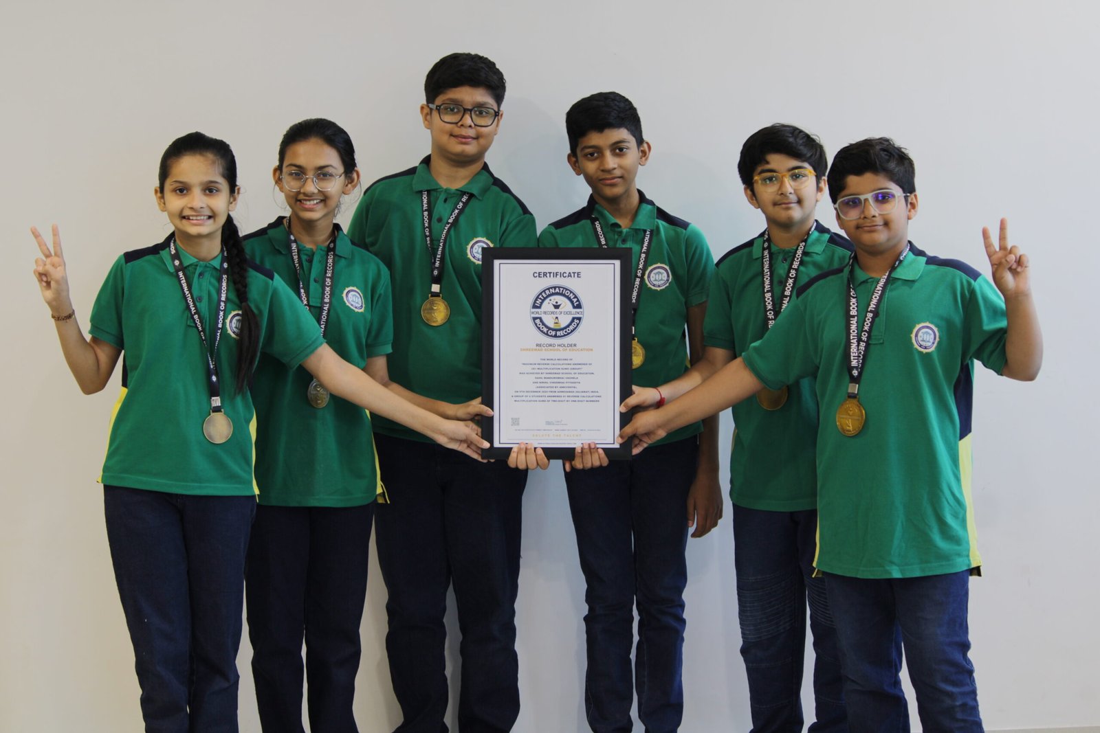 International Book of Records reverse calculation achievement team with certificate and medals